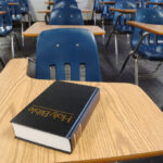 Holy Bible Lying on a Parochial School Desk
